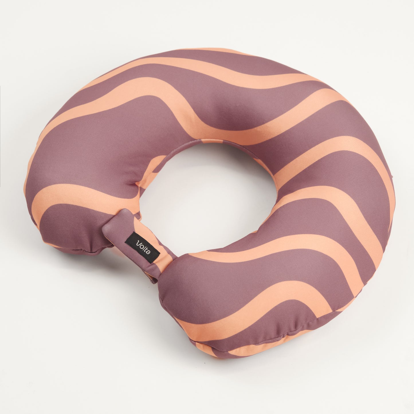 Lilac and peach striped travel neck pillow with a soft, ergonomic design displayed on a white background.